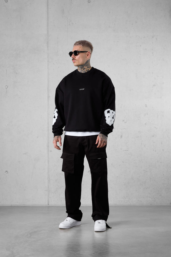 BLACK BLURRED HEARTS OVERSIZED SWEATER