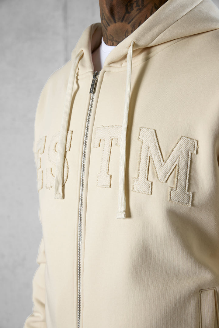 BEIGE ESTM APPLIQUÉ OVERSIZED ZIP HOODIE