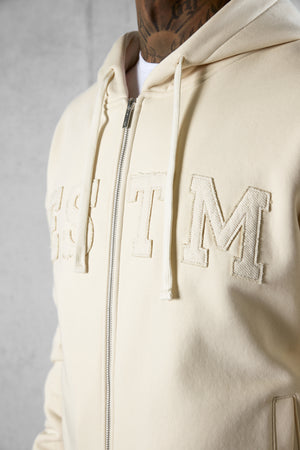 BEIGE ESTM APPLIQUÉ OVERSIZED ZIP HOODIE