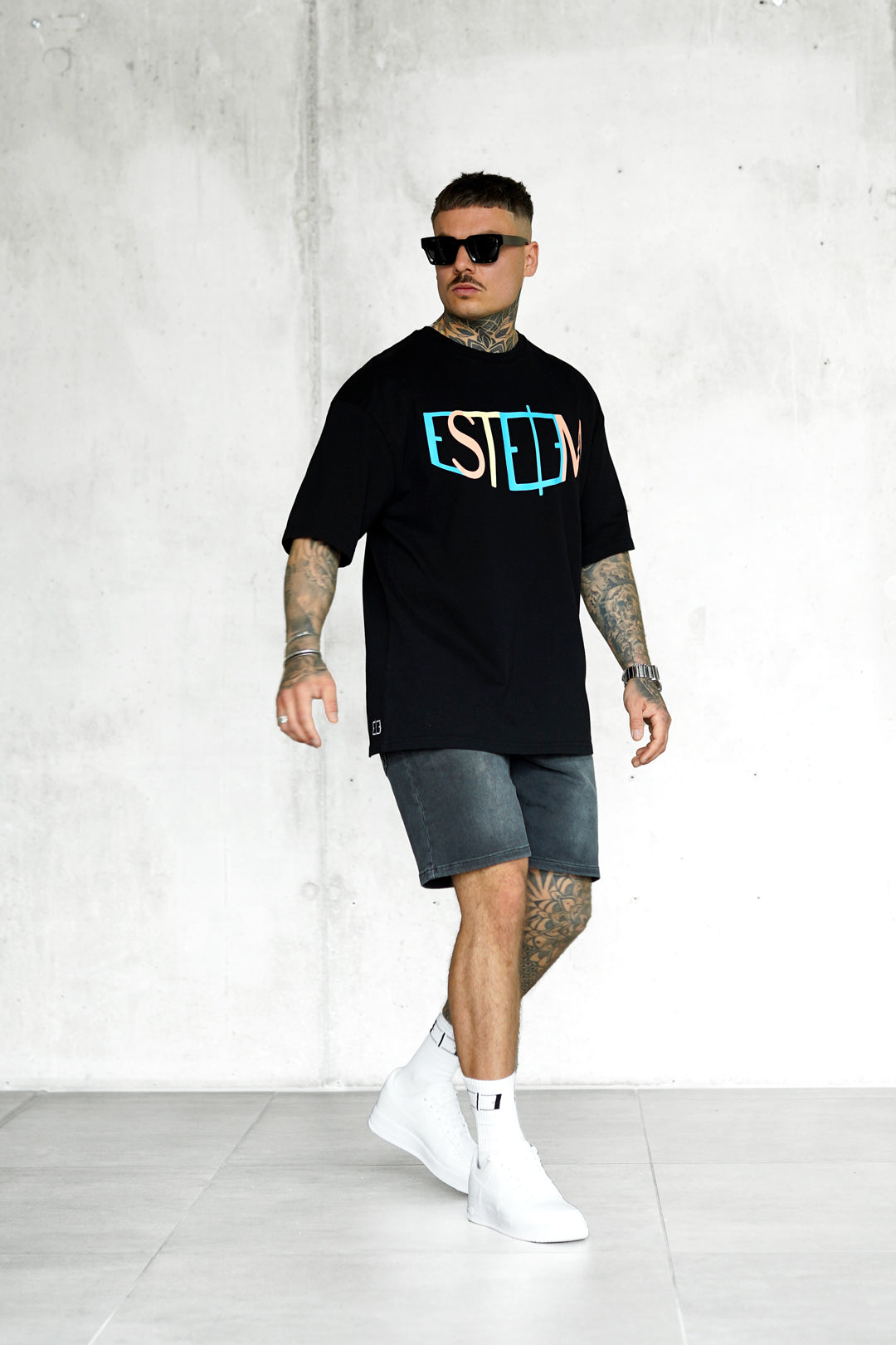 BLACK COLORED ARC OVERSIZED TEE