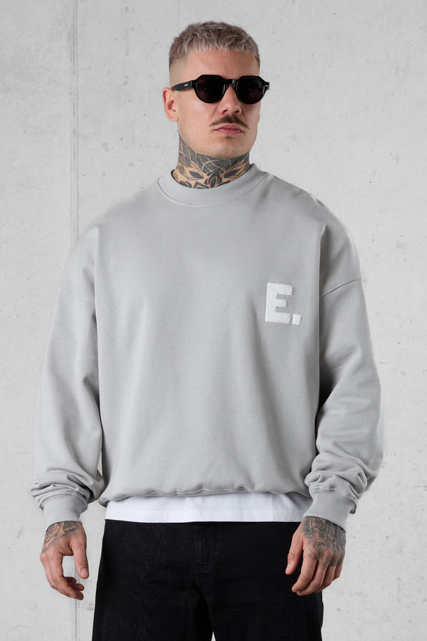 GREY E. STATEMENT OVERSIZED SWEATER
