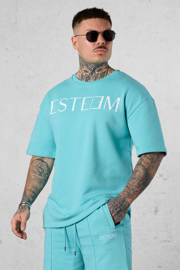 TURQUOISE LETTERING OVERSIZED SWEATTEE