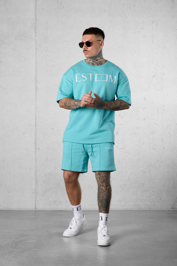 TURQUOISE LETTERING OVERSIZED SWEATTEE