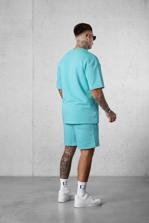 TURQUOISE LETTERING OVERSIZED SWEATTEE