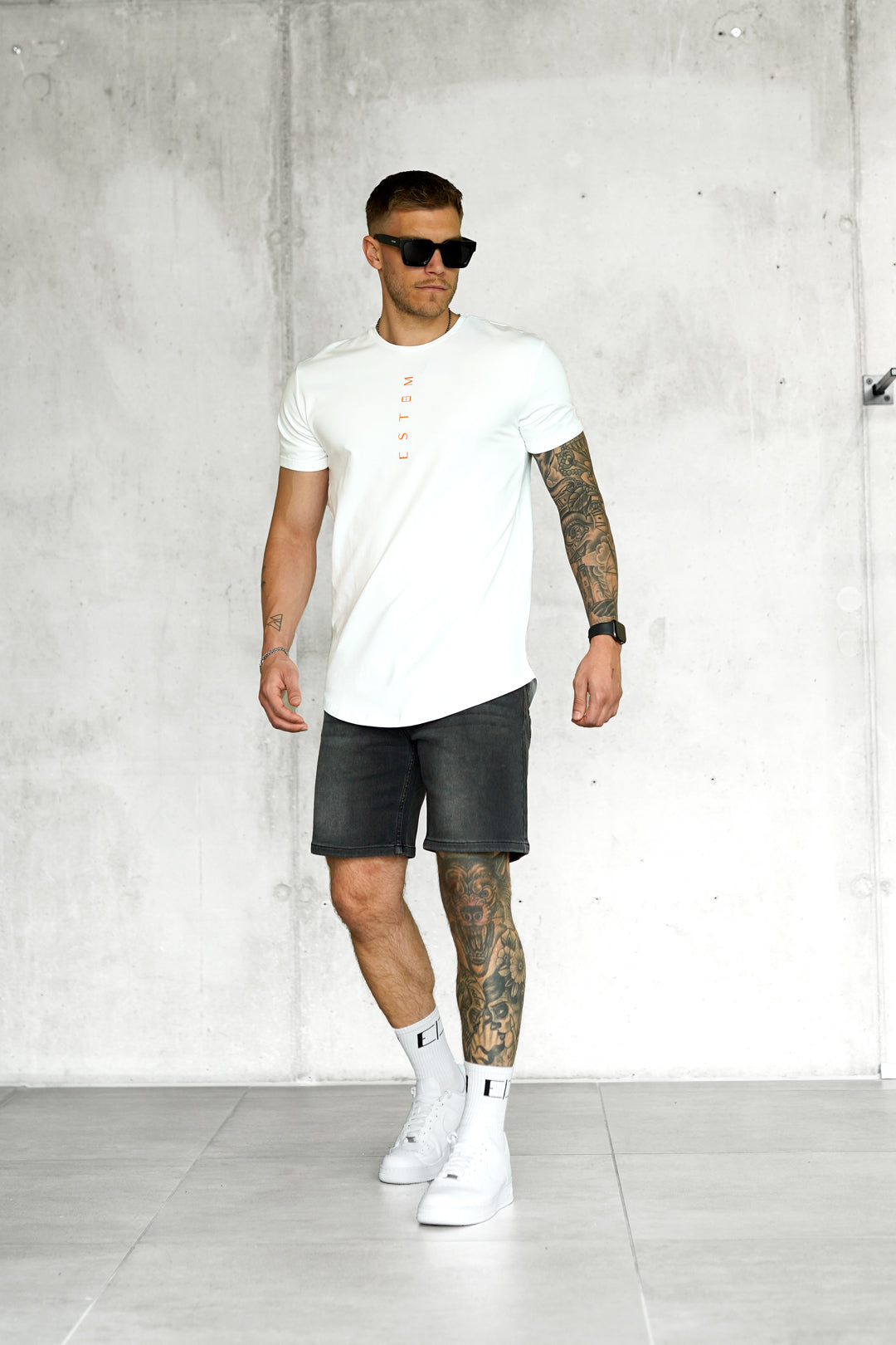 WHITE ORANGE VERTICAL TEE