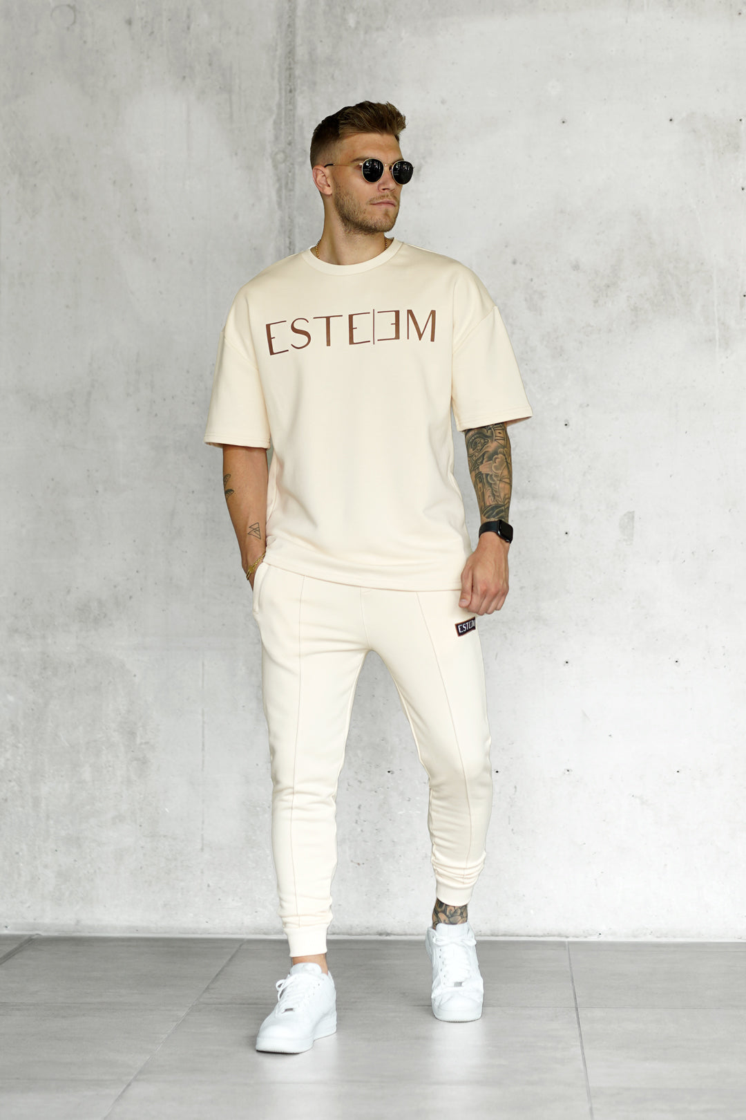 BEIGE PATCH SWEATPANTS