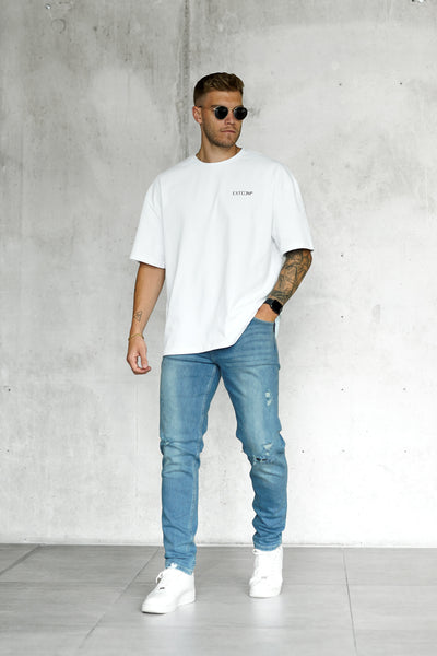WASHED BLUE DESTROYED STRAIGHT JEANS